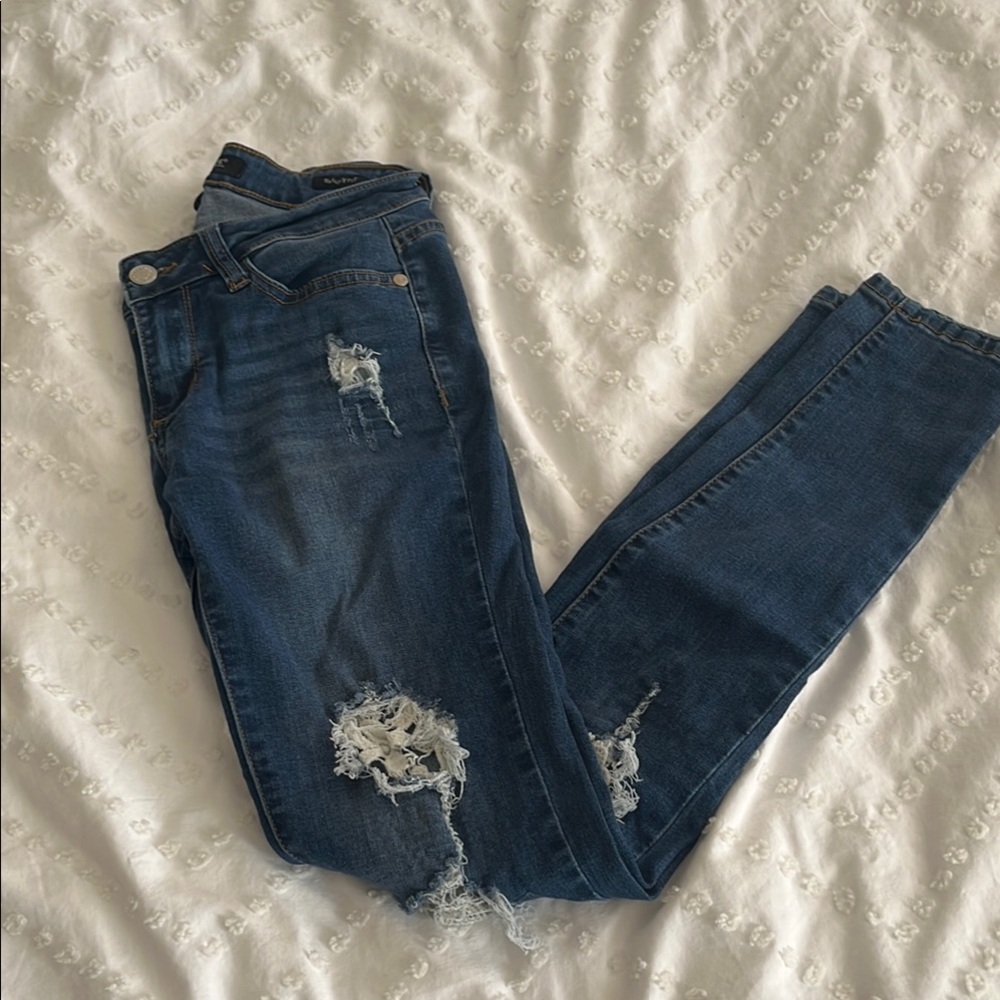 Distressed Blue Denim Jeans